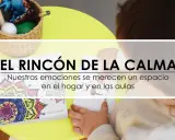 Un niño explora un rincón de la calma Montessori con tarjetas de emociones y un libro para colorear.
