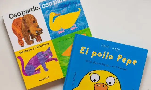 Los mejores libros para bebé de 1 año: "Oso pardo, oso pardo" con un oso y un gato morado, y "El pollo Pepe" con un pollito amarillo.